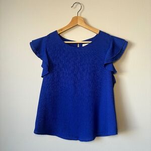 Blue short sleeve ruffle blouse Milk + Honey size L